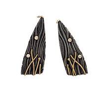 Gold, diamond and Steel earrings by Victoria Moore Gold, diamond and Steel earrings by Victoria Moore