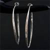 Hammered silver earrings by Emily Amey
